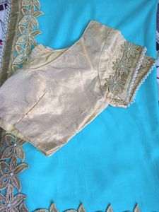 Elegant Turquoise Saree with Golden Embellishments