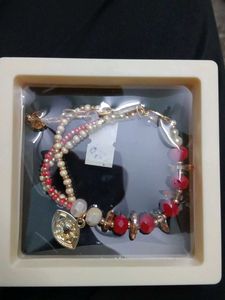 Elegant Beaded Bracelet with Charm