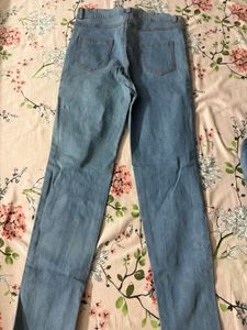 Distressed Blue Denim Jeans