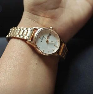 Rose Gold Titan Watch with White Dial