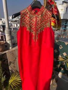 Red Embroidered Sleeveless Kurta.