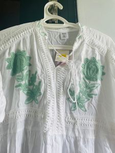 Beautiful white with green work middy ..