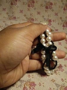 Elegant Pearl charm with Black Bow