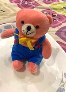 Cute Pink Teddy Bear with Blue Overalls
