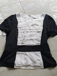 Chic Black & White Ruffle Top