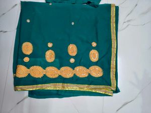 Elegant Teal Saree with Golden Embroidery