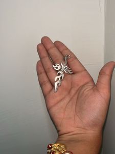 Unique Flame Cross Pendant