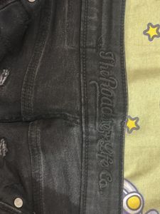 Faded black jeans