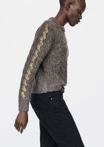 Zara sweater with gold-tone embellishments.