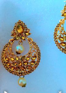 Elegant gold earing magtika set