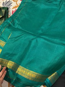 Elegant Teal Saree with Gold Border