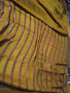Elegant mustard heavy party wear saree with blouse