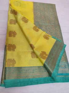 Vibrant Yellow Silk Saree with Elephant Motifs