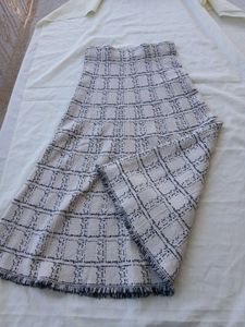 long skirt white and black colour or fabric is str