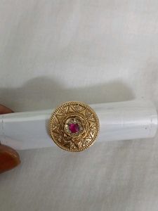 Elegant Gold Ring with Ruby Accent