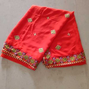 Vibrant Orange Embroidered Saree