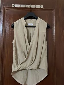 Elegant Sleeveless Drape Top