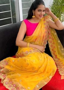 Elegant Yellow Embellished Saree