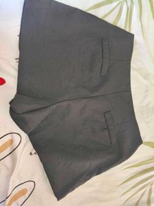 Chic Black Buttoned Shorts