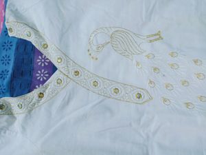 cotton white kurthi with peacock embroidery design
