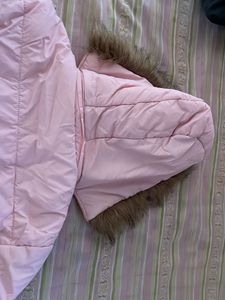 Pink puffer jacket