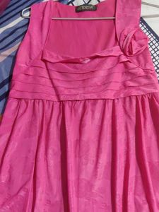 Chic Pink Sleeveless Top with Floral Accent