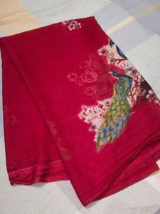 Vibrant Red Saree with Peacock Print