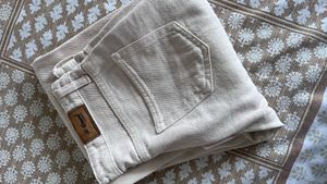 Off white cargo style denim