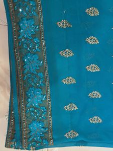 Beautiful Teal Saree with Embellishments