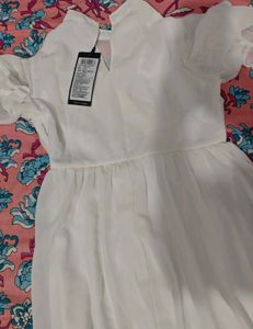 Chic White Mini Dress with Ruffle Sleeves