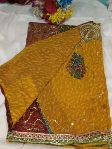 Embellished Brown Net Saree with blouse