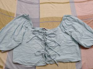 blue tie up top..