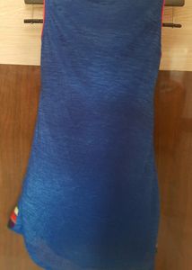 bright navy blue long top with attached sleeve