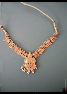 7.Exquisite Gold-Tone Necklace with Pendant