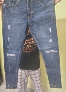 Distressed Blue Denim Jeans