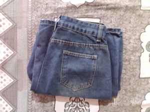 Distressed Wide Leg Denim Jeans