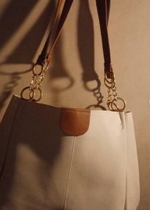 Chic Cream Tote Bag with Gold Chain Accents