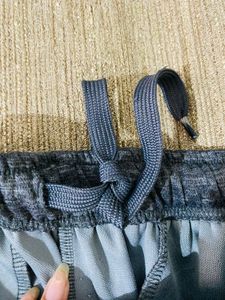 grey ankle length pants