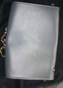 Elegant Gray Clutch with Gold Chain