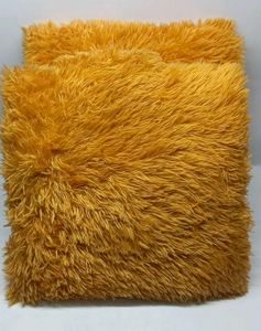 2 Golden fur Cushions