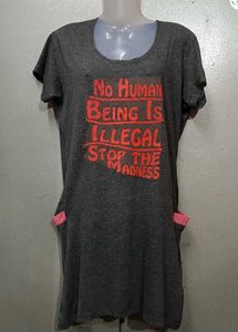Statement T-Shirt - No Human Being Is Ille
