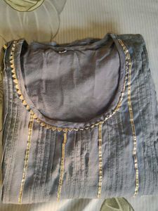 Elegant Grey Kurta with Gold Embellishments