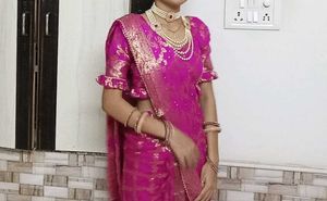 Vibrant Pink Saree with Golden Motifs