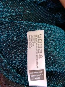 I'm Selling a Sheer Shimmer Blue Top