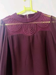 Chic Burgundy Mini Dress with Unique Neckline Deta