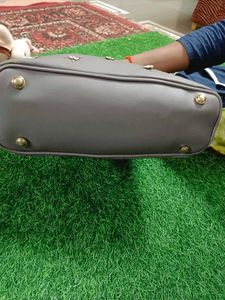 Stylish Gray Handbag with Teddy Charm