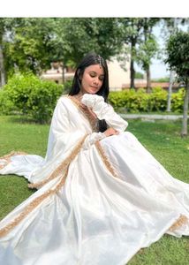Elegant White Ethnic Gown with Gold Trim