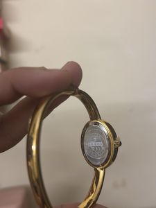 Elegant Gold Tone Oval Watch slightly damaged