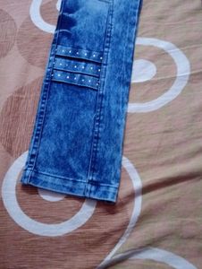 Stylish Blue Wash Jeans with Embellished Details