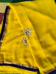 chiffon saree with velvet lace design